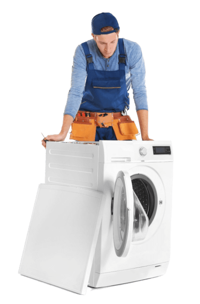 A commercial washing machine repair technician standing with white commerical vwashing machine